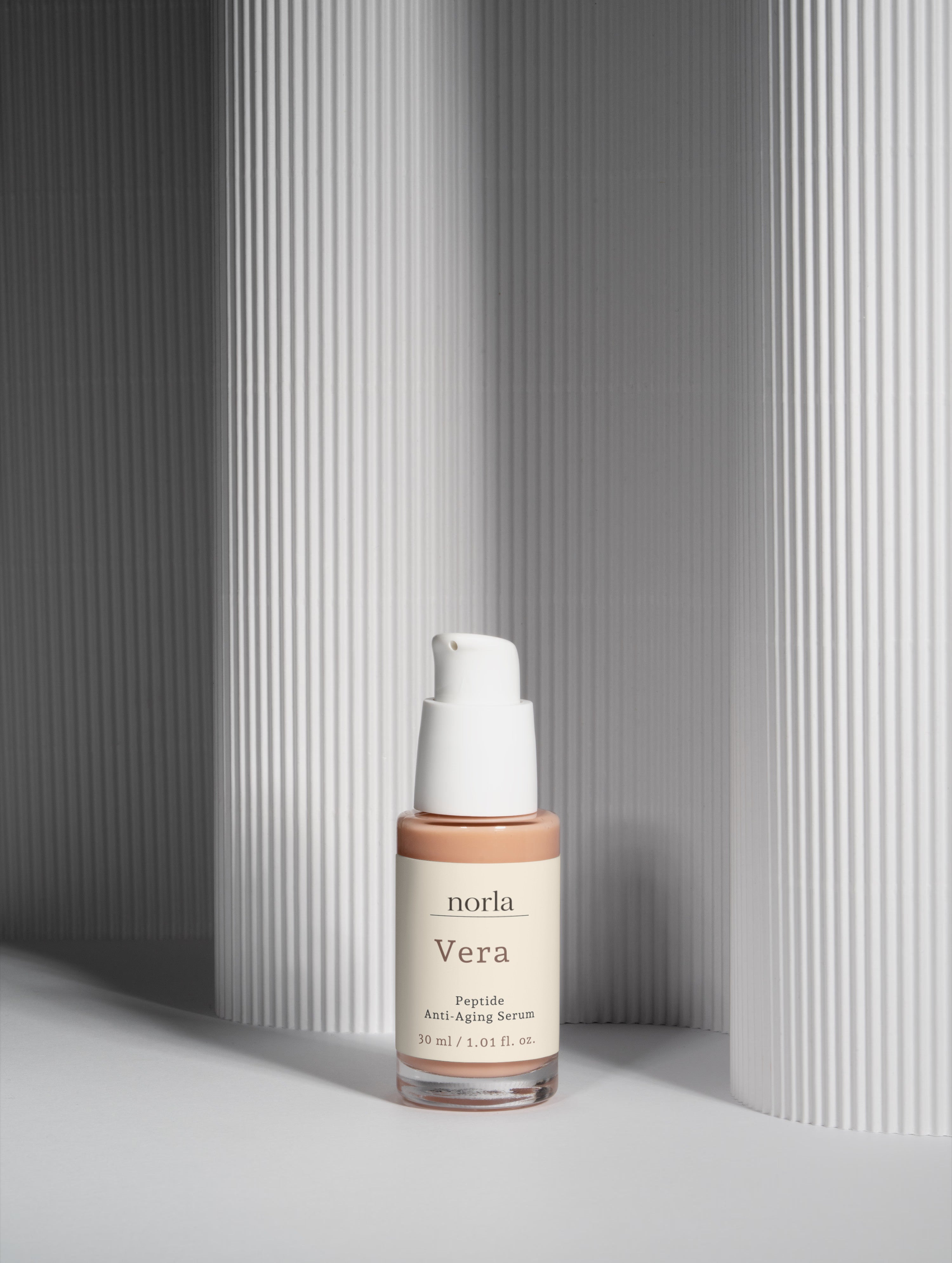 Norla Vera peptide serum carton showing the ingredient list and product details