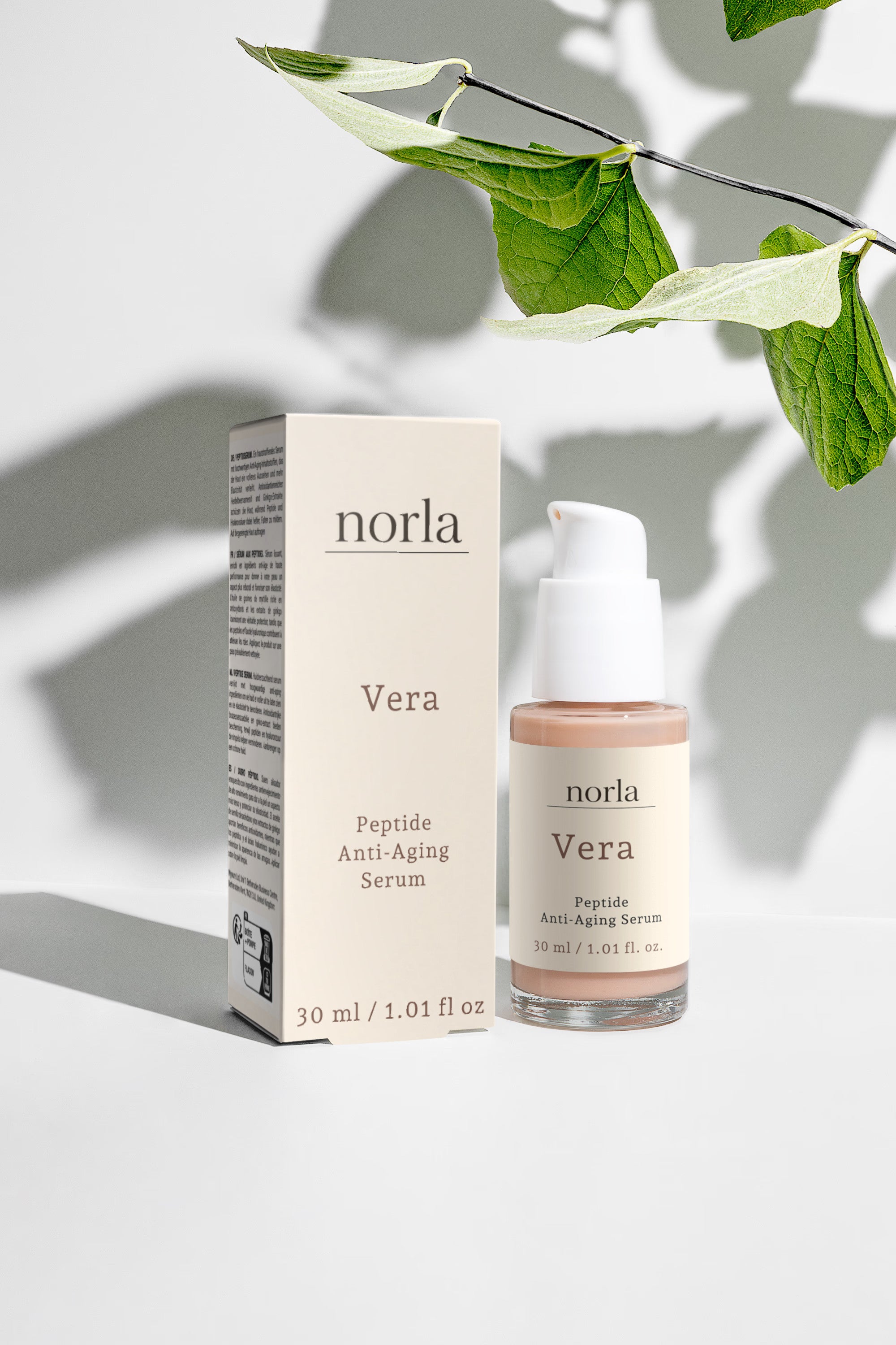 Norla Vera peptide serum, 30 ml pump bottle photographed against a pale background