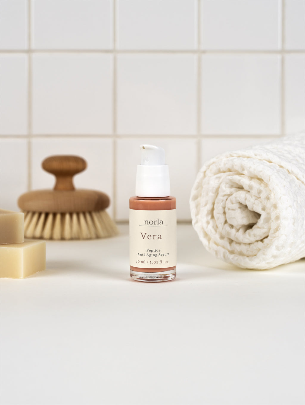 Norla Vera peptide anti-aging serum presented with its packaging