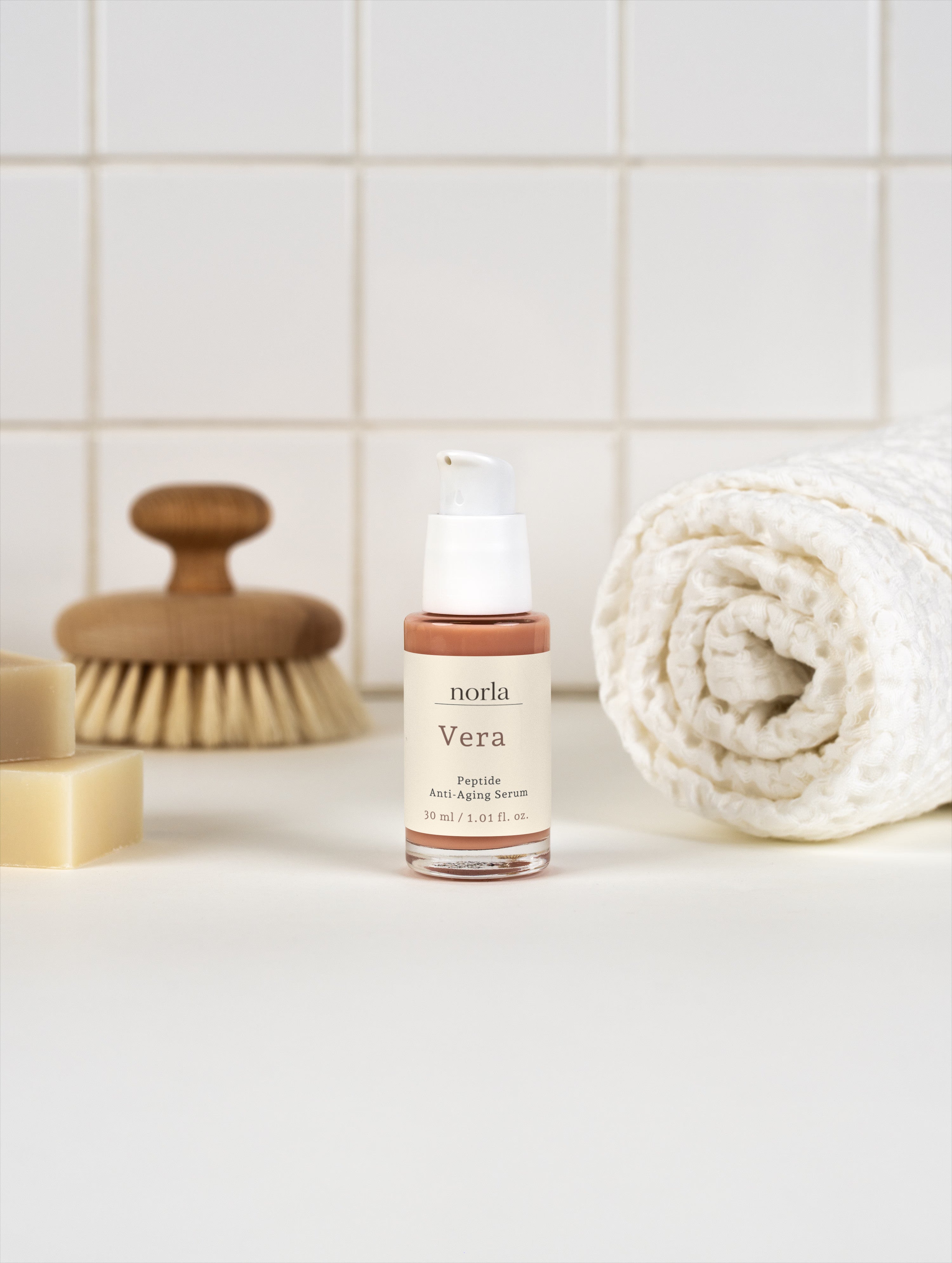 Norla Vera peptide anti-aging serum presented with its packaging